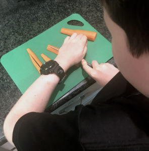 Get kids cooking - cutting carrot sticks