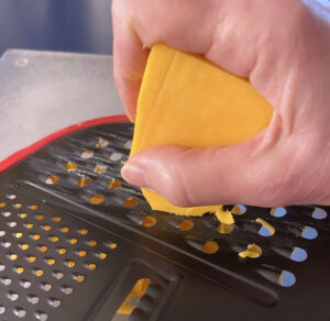 ONE great grating tool...catches the cheese as you grate