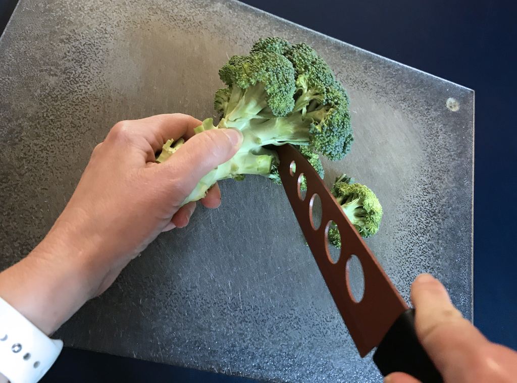 Start chopping broccoli by removing the florets
