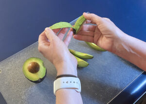 Skin peels easily from a ripe avocado