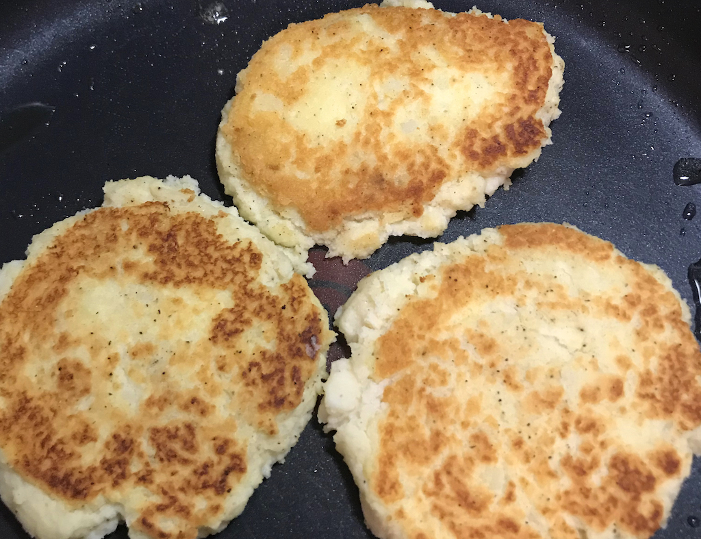 Frying mashed potato pancakes