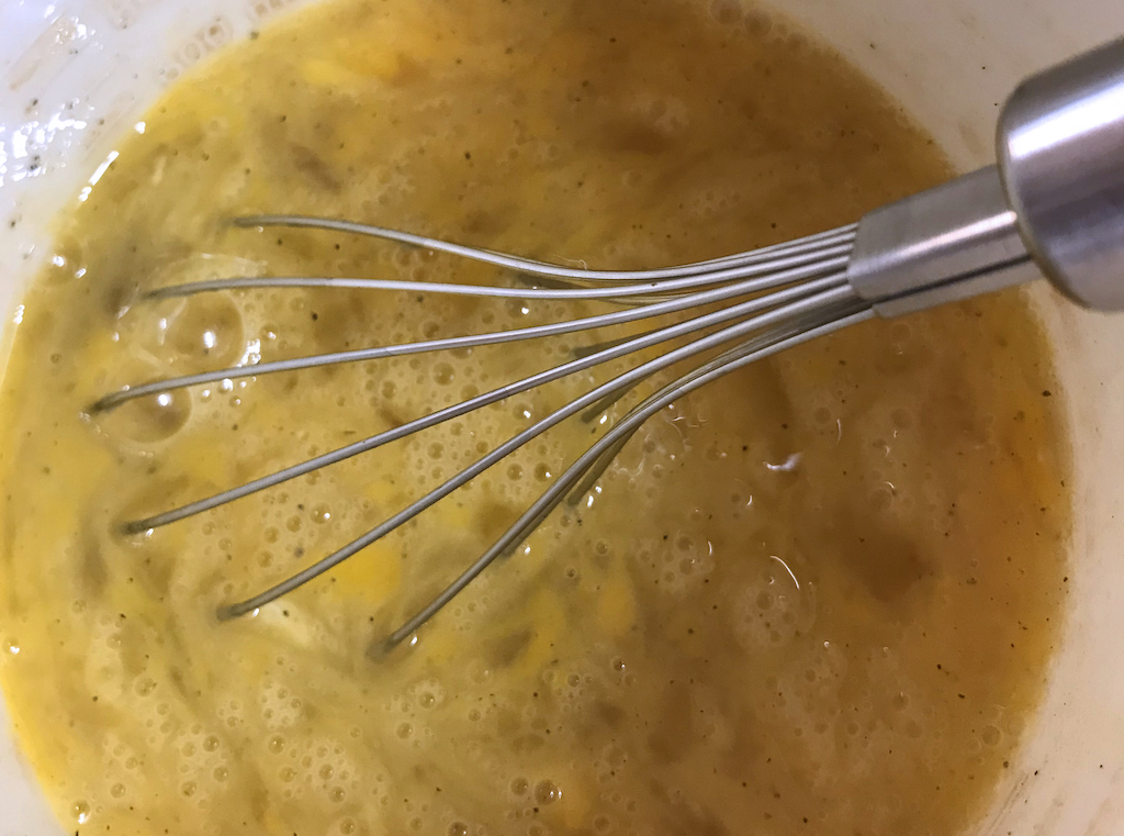 Scramble eggs, salt and pepper with a whisk