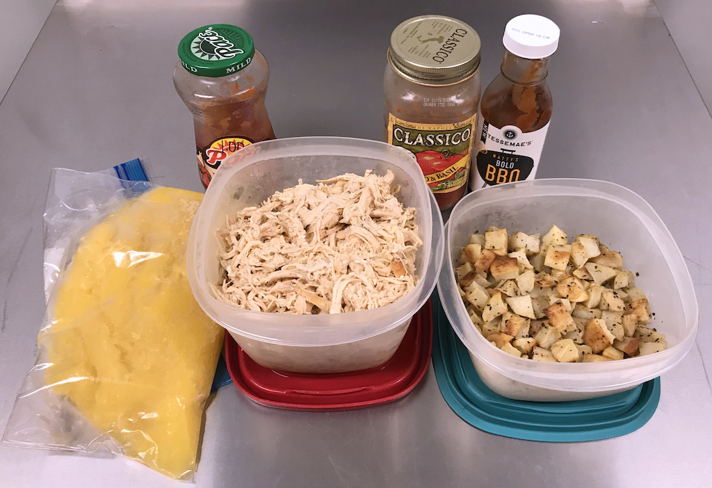 Spaghetti squash, cooked shredded chicken, roasted potato chunks and ethnic sauces help me build Whole30 camp suppers