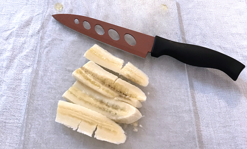 slices of banana cut laying on its back