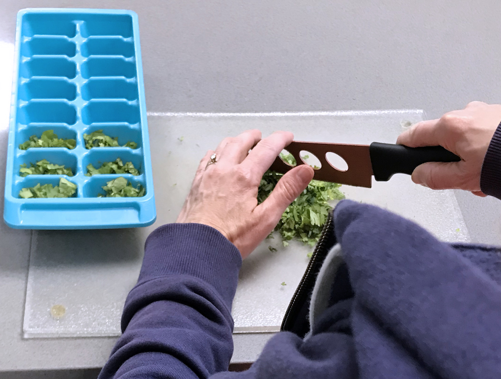 finely mince herbs before freezing in ice