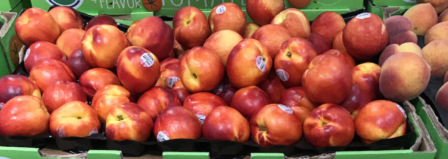 Nectarines in the peach sale bin