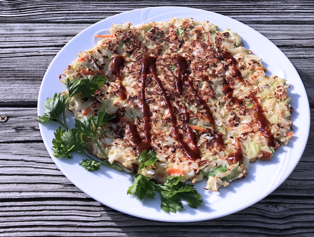 A cabbage pancake (okomiyaki) is a meatless treat