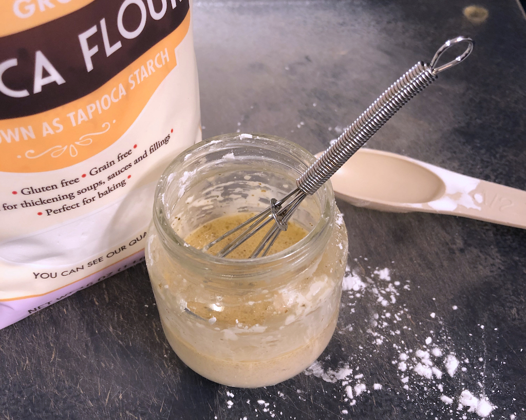 Making a slurry of flour and liquid to thicken your broth