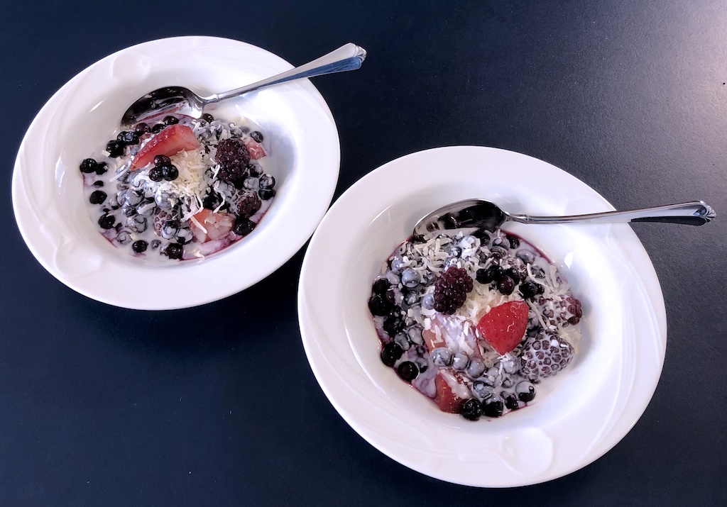 Frozen berries topped with coconut milk...YUM!